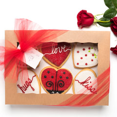 A Dozen Decorated Red Valentine's Day Cookies